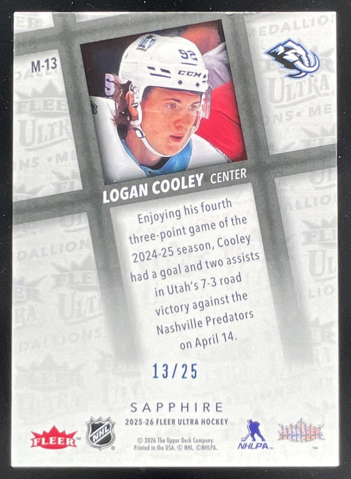 2025-26 Upper Deck Fleer Ultra Medallions Sapphire Blue #M-13 Logan Cooley /25 product image 2, provided for visual