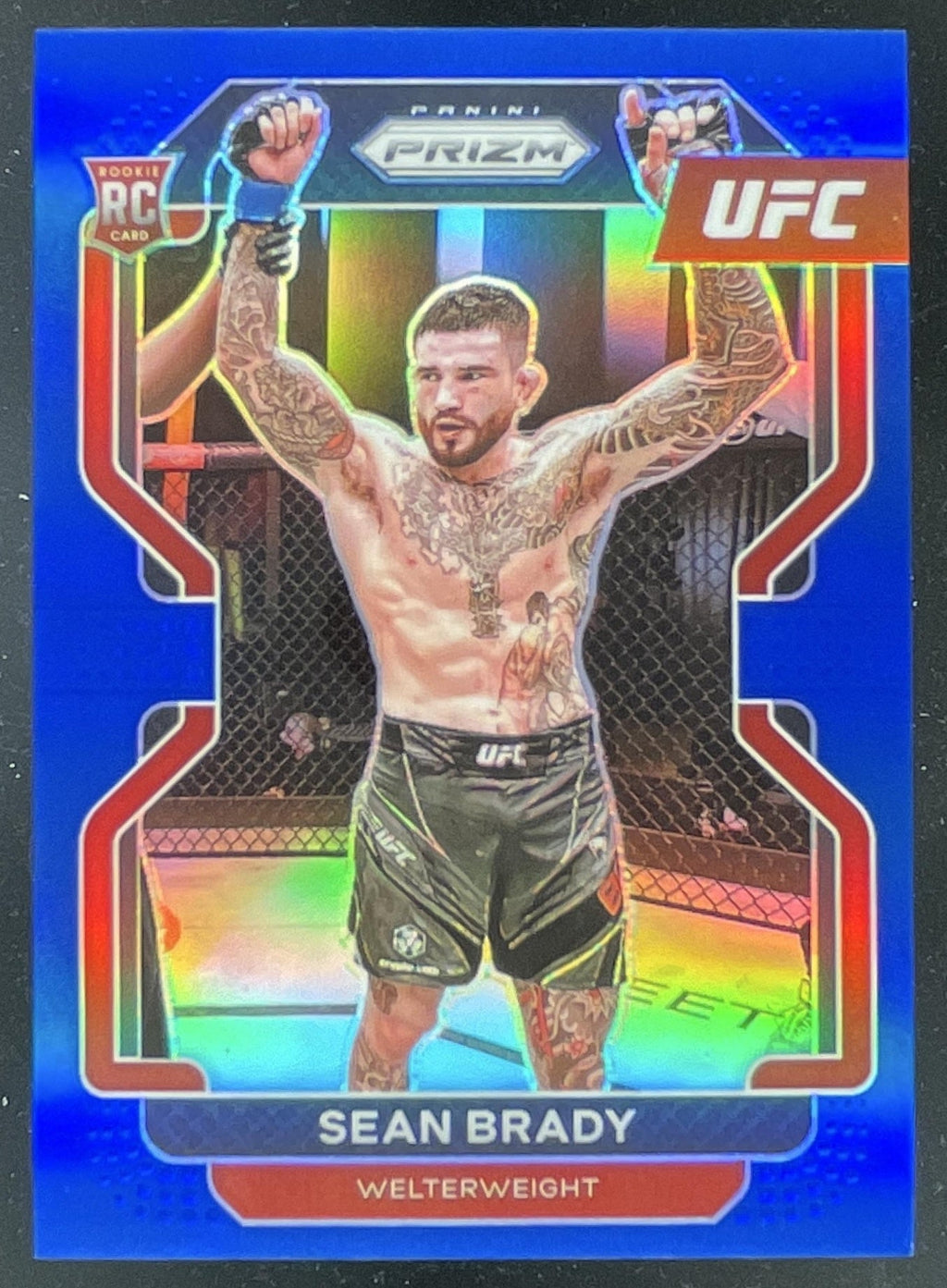 2022 Panini Prizm UFC Blue Prizms #162 Sean Brady RC /199 product image 1, provided for visual reference and product detail