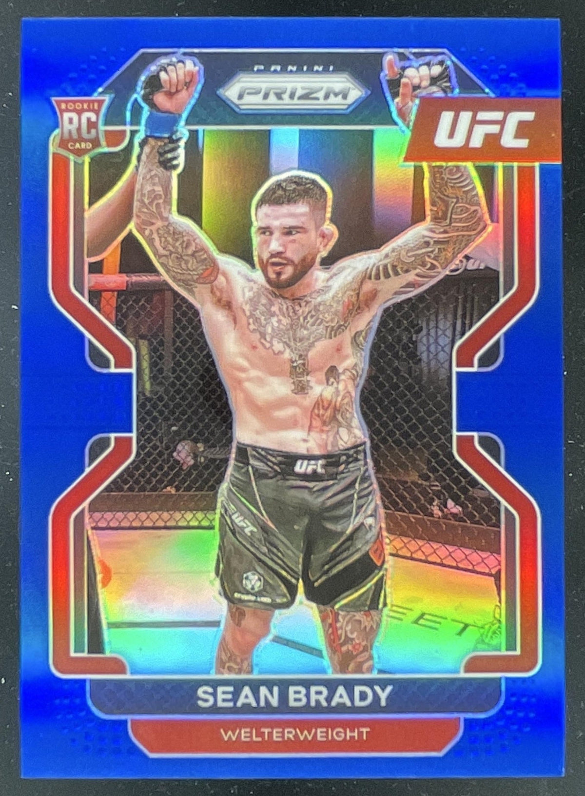 2022 Panini Prizm UFC Blue Prizms #162 Sean Brady RC /199 product image 1, provided for visual reference and product detail
