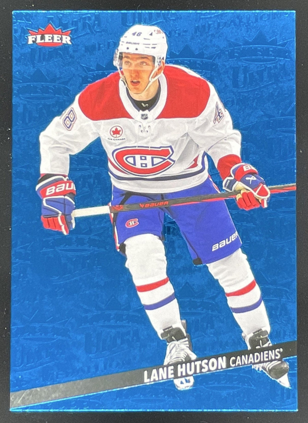 2025-26 Upper Deck Fleer Ultra Medallions Sapphire Blue #M-18 Lane Hutson /25 product image 1, provided for visual reference